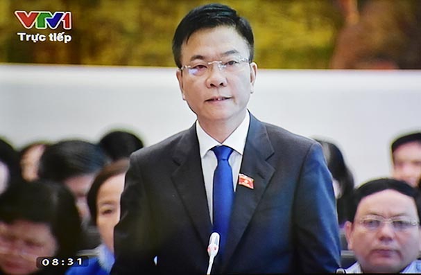 Bộ trưởng Lê Thành Long trả lời chất vấn tại Phiên họp thứ 22 của Uỷ ban Thường vụ Quốc hội