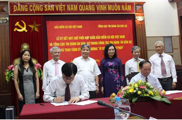 Ký kết Quy chế phối hợp giữa Bảo hiểm xã hội Việt Nam và Tổng cục Thi hành án dân sự