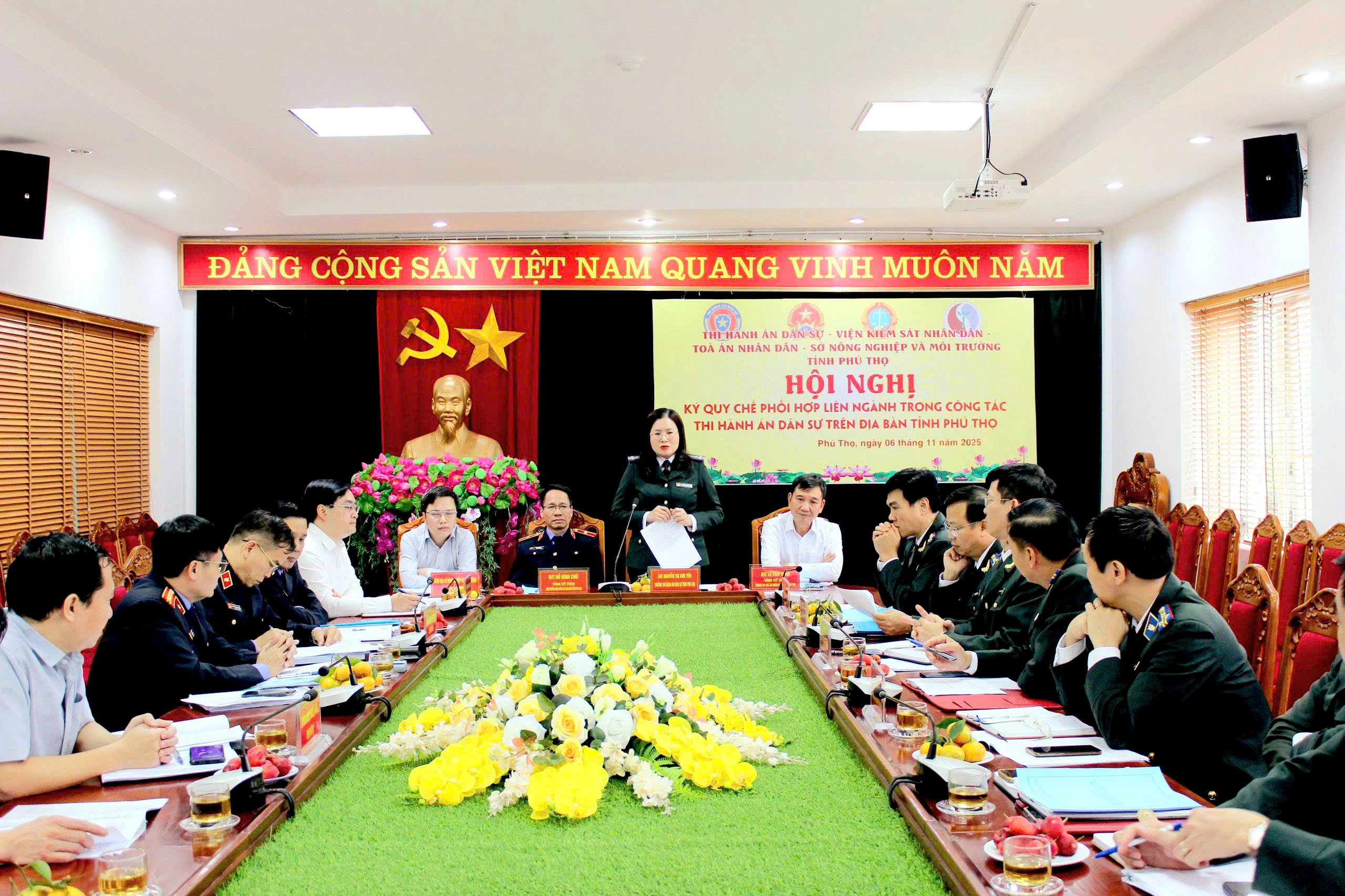 A group of people sitting at a tableAI-generated content may be incorrect.