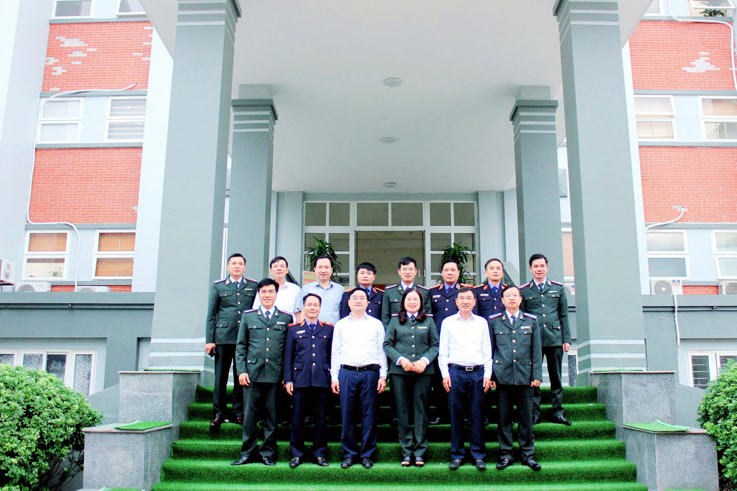 A group of people standing on stairsAI-generated content may be incorrect.